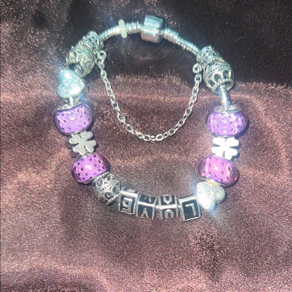 New Pandora Charm bracelet. Silver and purple